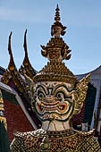 Bangkok Grand Palace, pair of statues of demons (yakshas) gatekeepers of the entrances in the western gallery of the Temple of the Emerald Buddha (Wat Phra Kaew). 